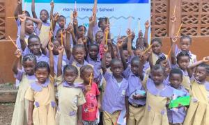 Students with their new pencils