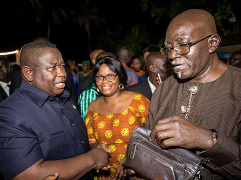 President Bio shaking hands of journalists