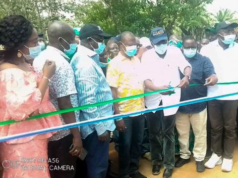 CM cutting the tape at the St joseph secondary school   bridge linking blame center