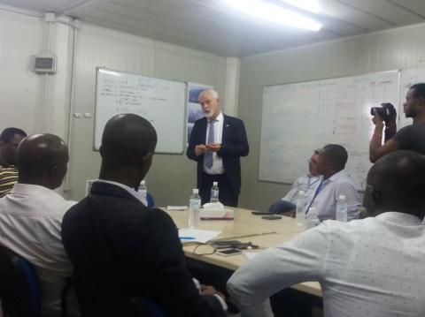 Country Manager of Bollore addressing journalists