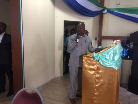 Dr. Victor Kabbia, reading out the report