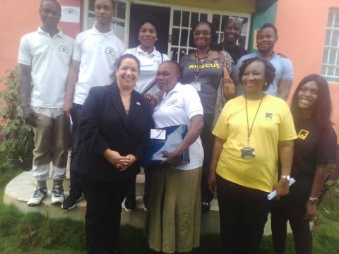 IRC and Rainbow Staff posing with the US Ambassador