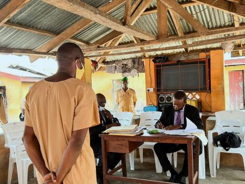 A prisoner faces Justice Brown-Makeni inside the prison as case is reviewed