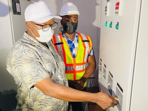 Kanja Sesay switching on the power in Thonko Limba