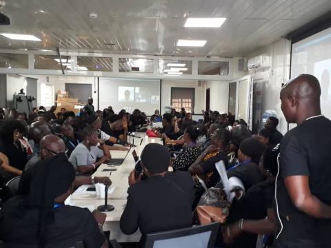 Local UN staff in black as a sign of protest over pay