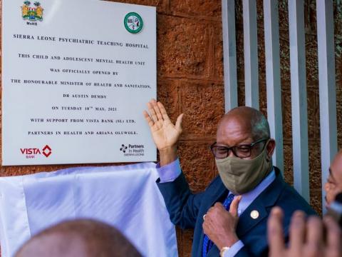 Minister of health Dr Austin Demby opens the new clinic