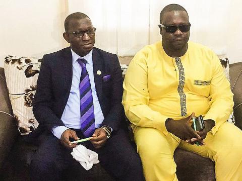 L-R: New Minister of Labour Alpha Timbo and his predecessor Adekunle Joliff Milton King