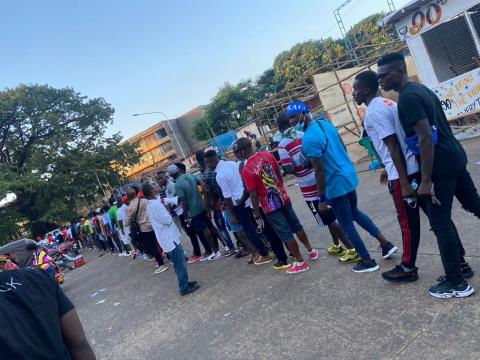 People queuing for COVID-19 Vaccination during outreach by a team from FOCUS 1000