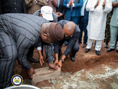 President Bio laying the symbolic foundation stone at the construction site on Tuesday