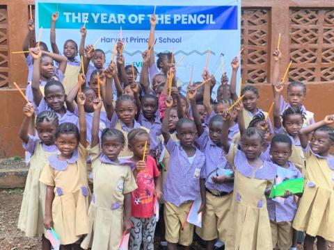 Students with their new pencils