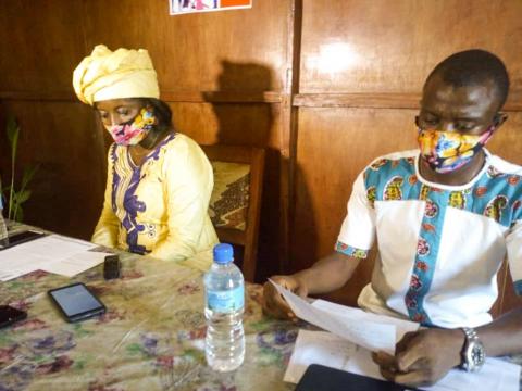 Turay (R) and Executive Director Conteh (L)