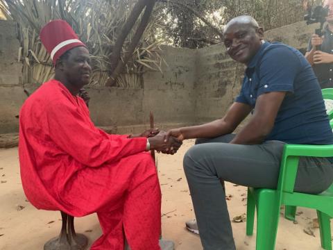 Umaru Fofana in a handshake with the King of Oussouye