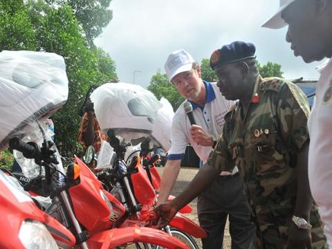 Donated bikes being inspected by a representative of RSLAF