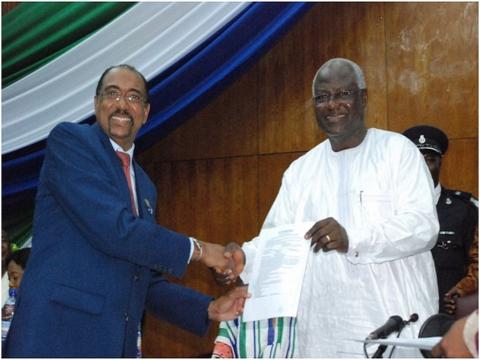 UNAIDS Executive Director, Michel Sidibe and President Ernest Bai Koroma after the signing 