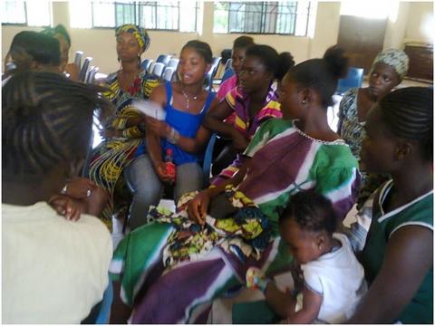 some teenage mothers listening in to the benefactor